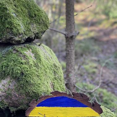 Wood carving with Ukrainian flag